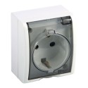 Base superficie, schuko 2p+t, 16a 250v~, ip54, serie aquarius, blanco con tapa transparente, blister